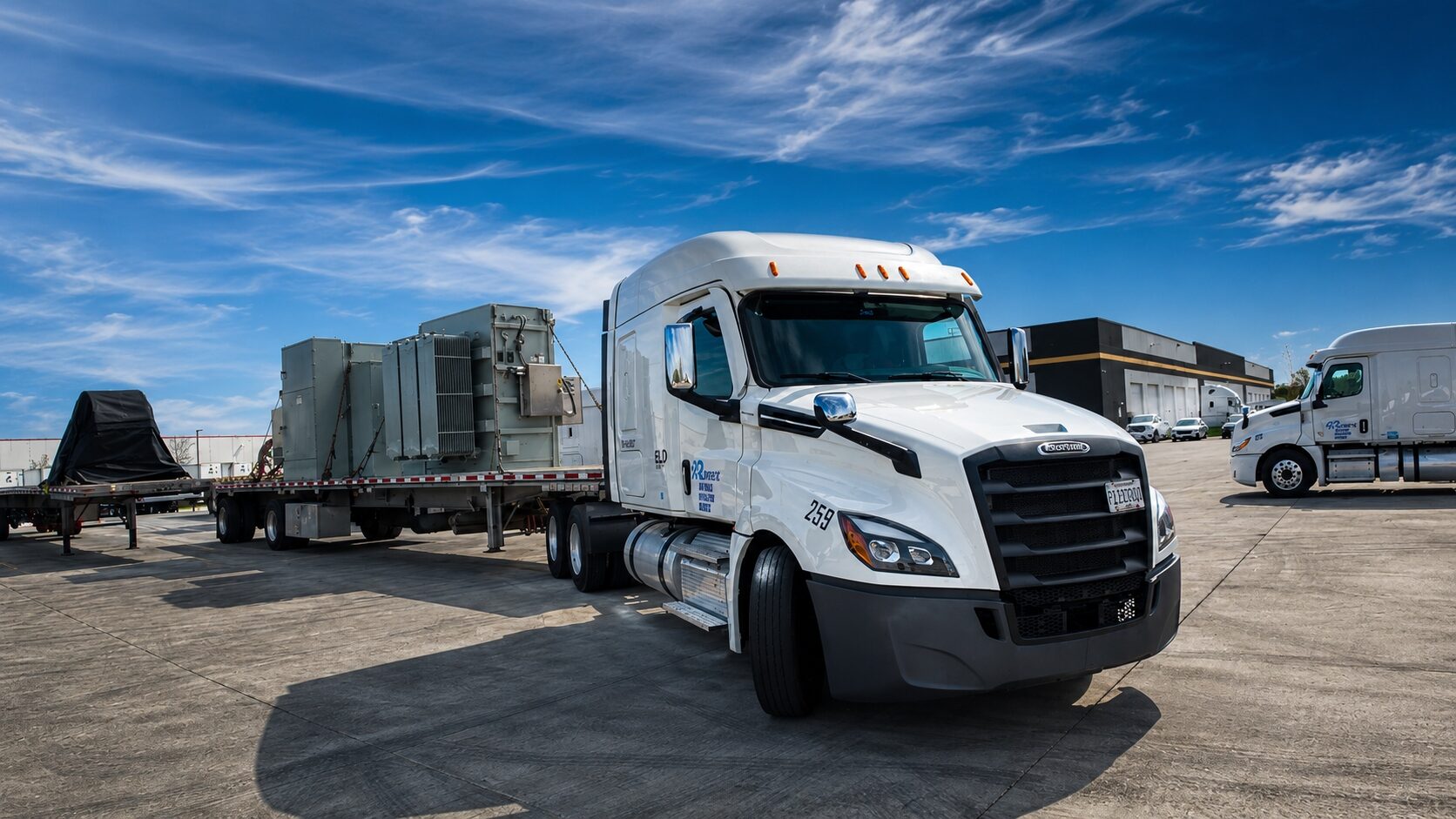 Run Direct flatbed hauling an electrical transformer, open-deck freight